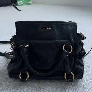 Genuine vintage black Miu Miu two way shoulder bag.